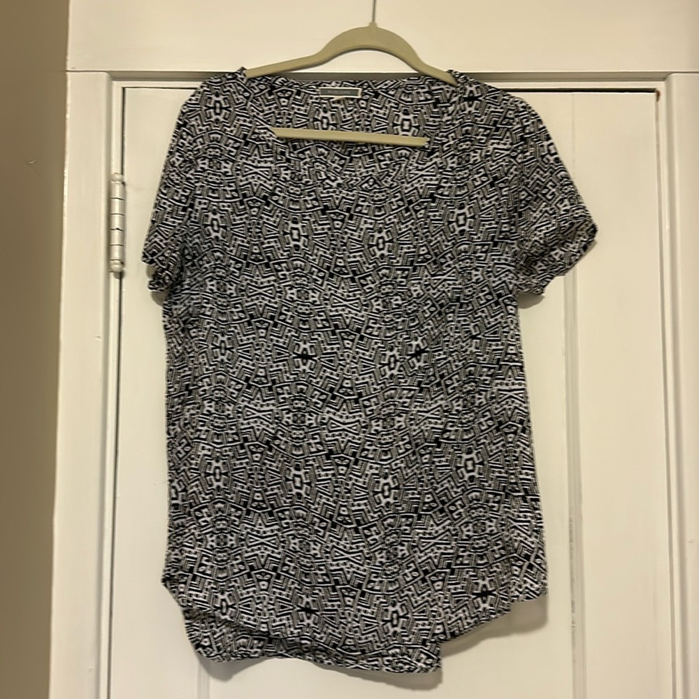 Sweet, breezy, black and white short sleeved shirt, with small breast pocket